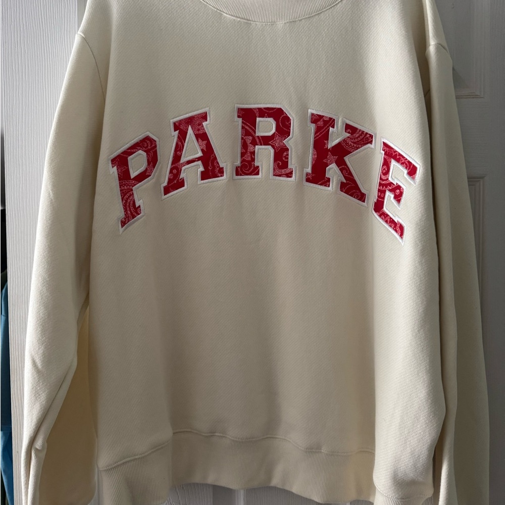Parke Women's Cream Sweatshirt with Red Accents